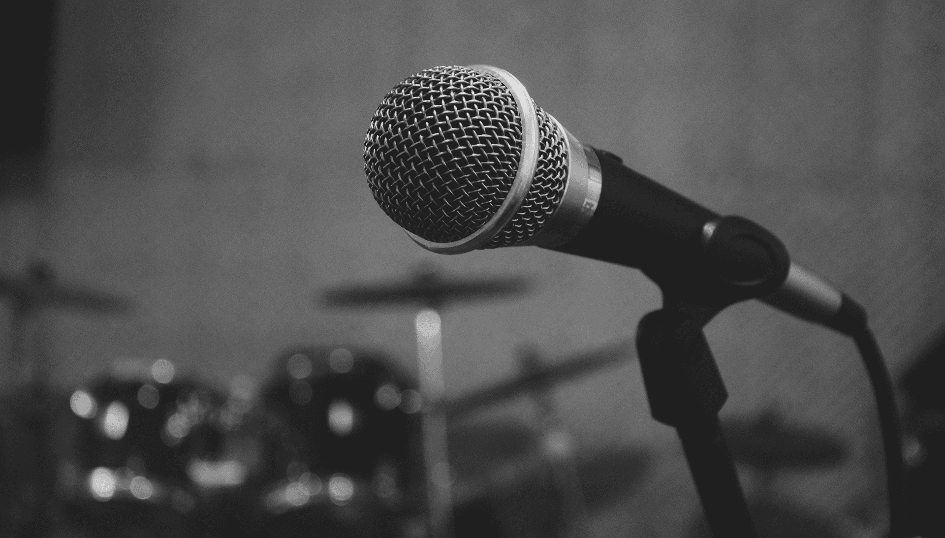 photo of a microphone in a music studio